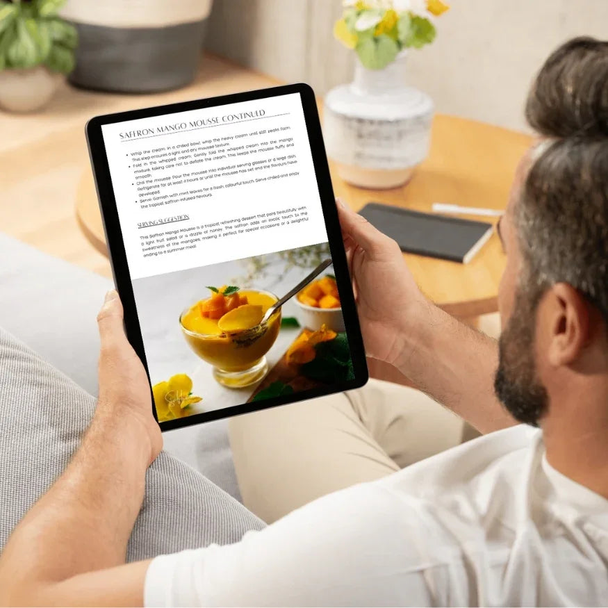 man looking at saffron recipe