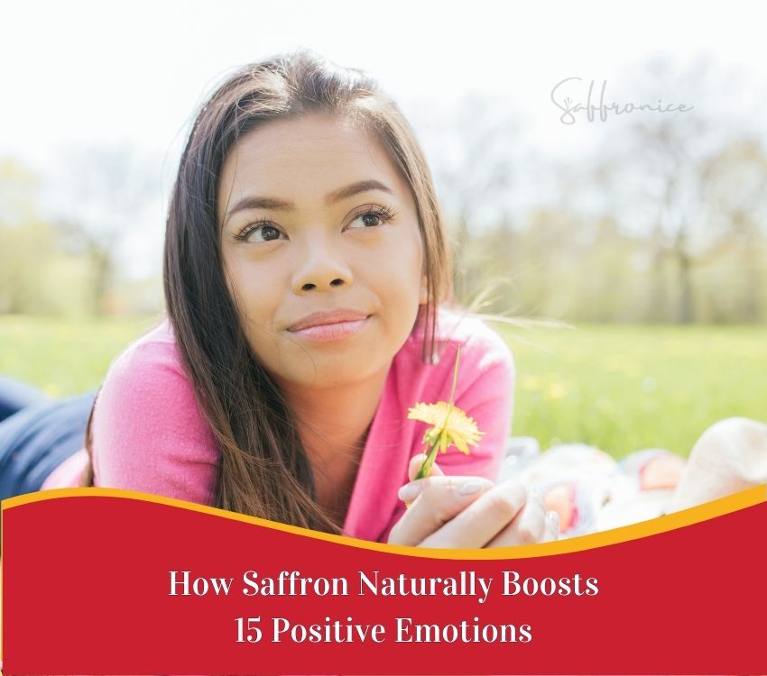 Young woman lying on grass holding a yellow flower outdoors, promoting saffron's positive emotional benefits