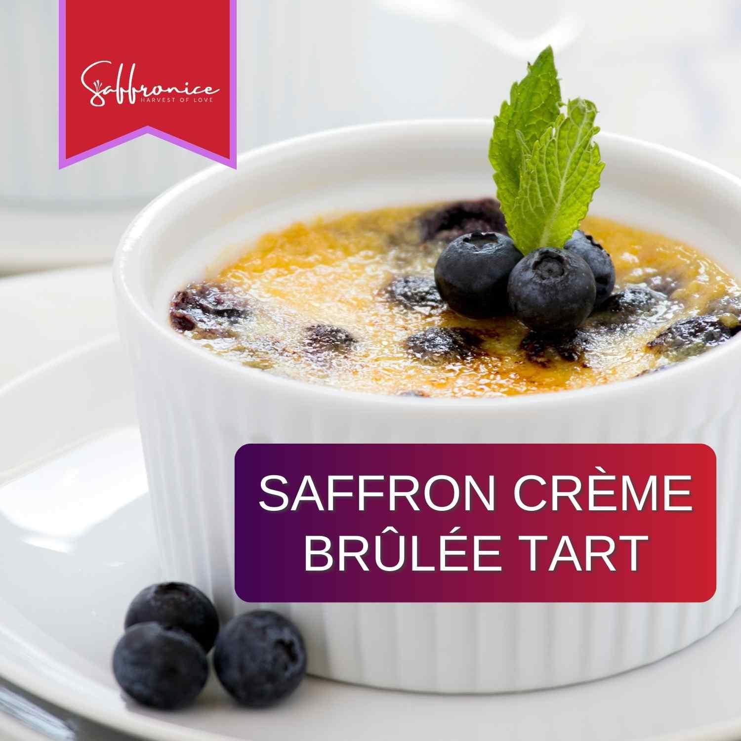 Saffron crème brûlée tart in white ramekin topped with blueberries and mint on white plate