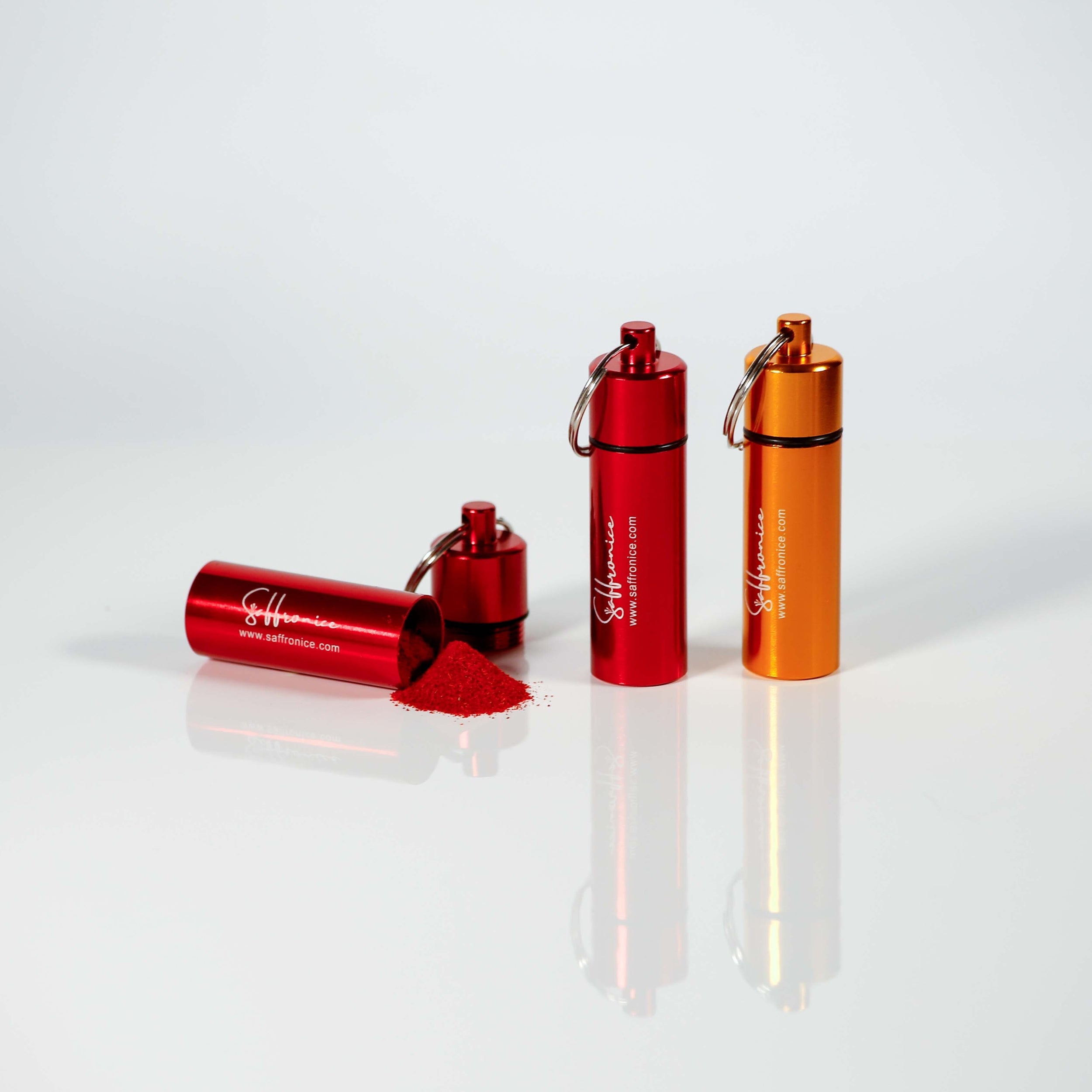 Gold and red cylinder for saffron powder
